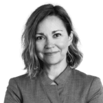 Lindsay Euller, a white woman with short hair smiling.