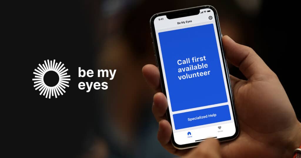 Hand holding iPhone with blue background and white text, Be My Eyes logo on left in white